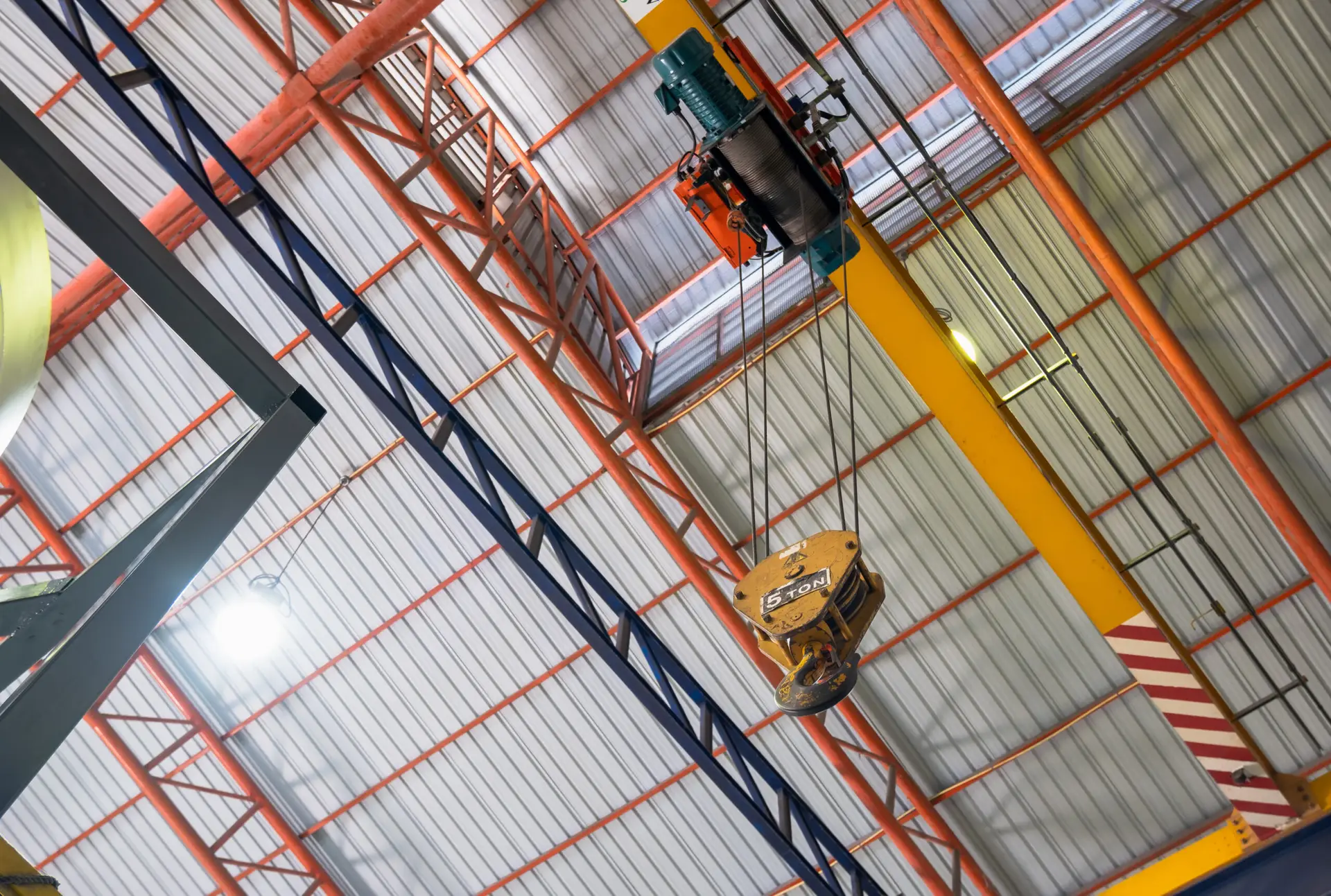 The construction crane in factory. Factory overhead crane